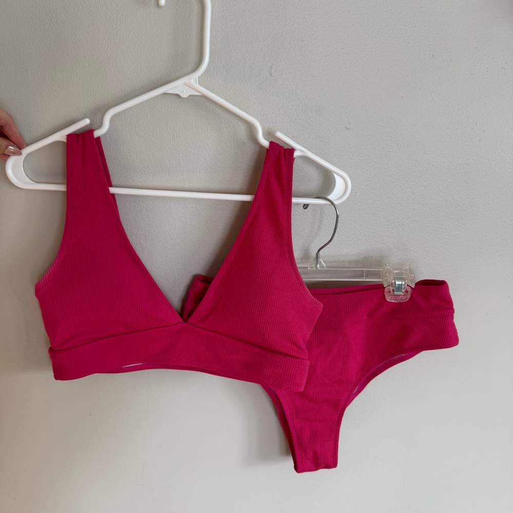 Hot pink ribbed deep plunge swim top with matching mid rise cheeky bottoms